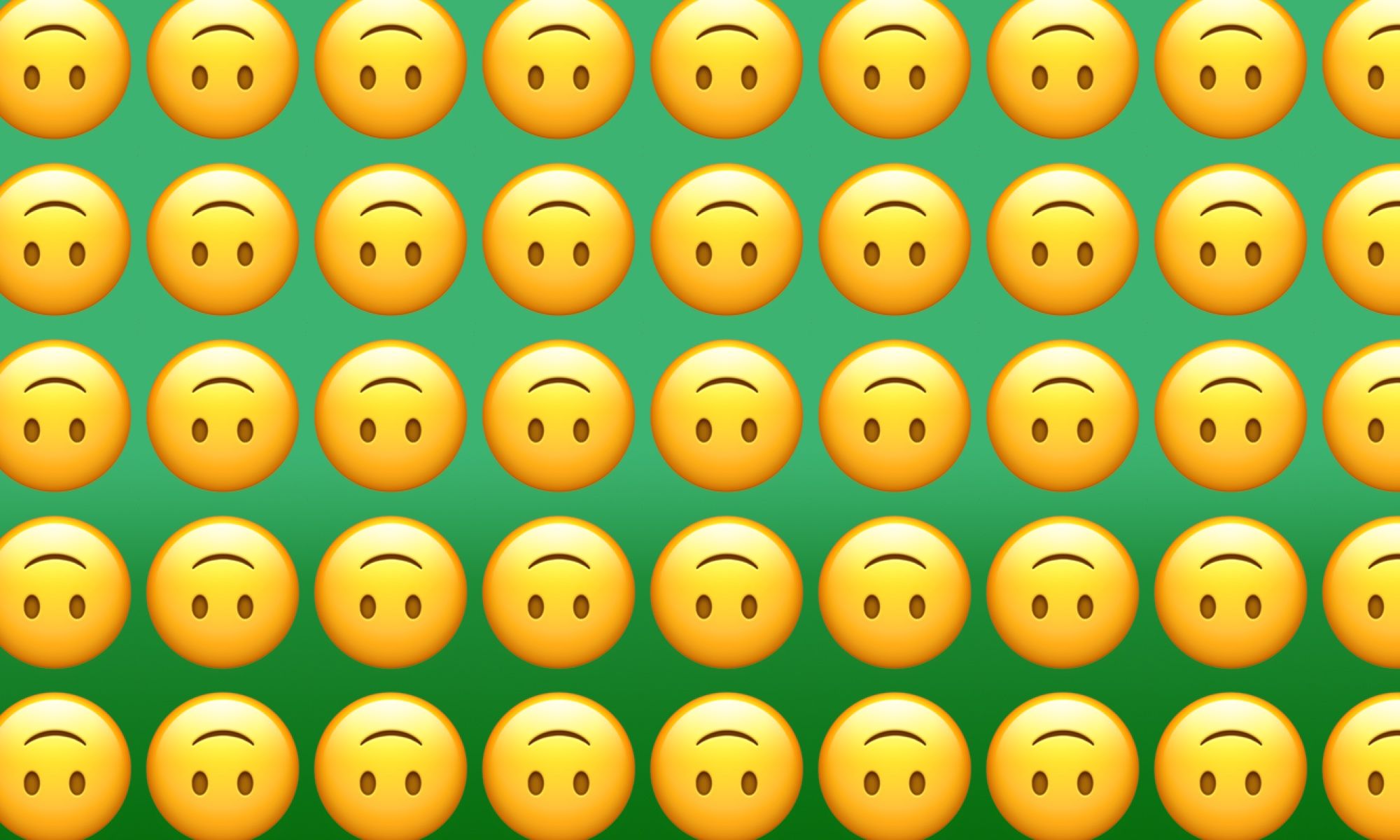 what does an upside smiley emoji mean. what does the upside down smiling fa...